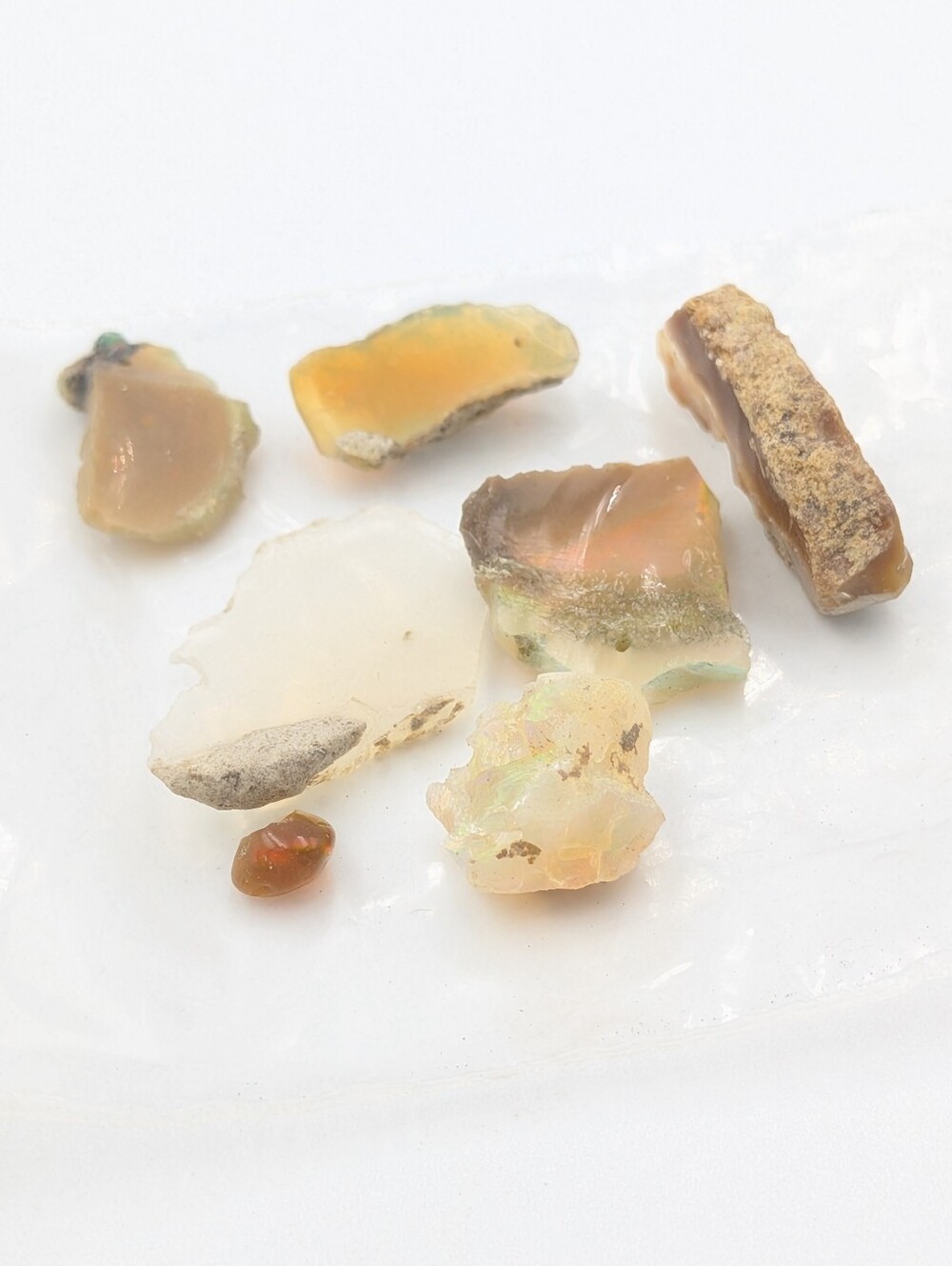 5/25$   Rough welo opal beads